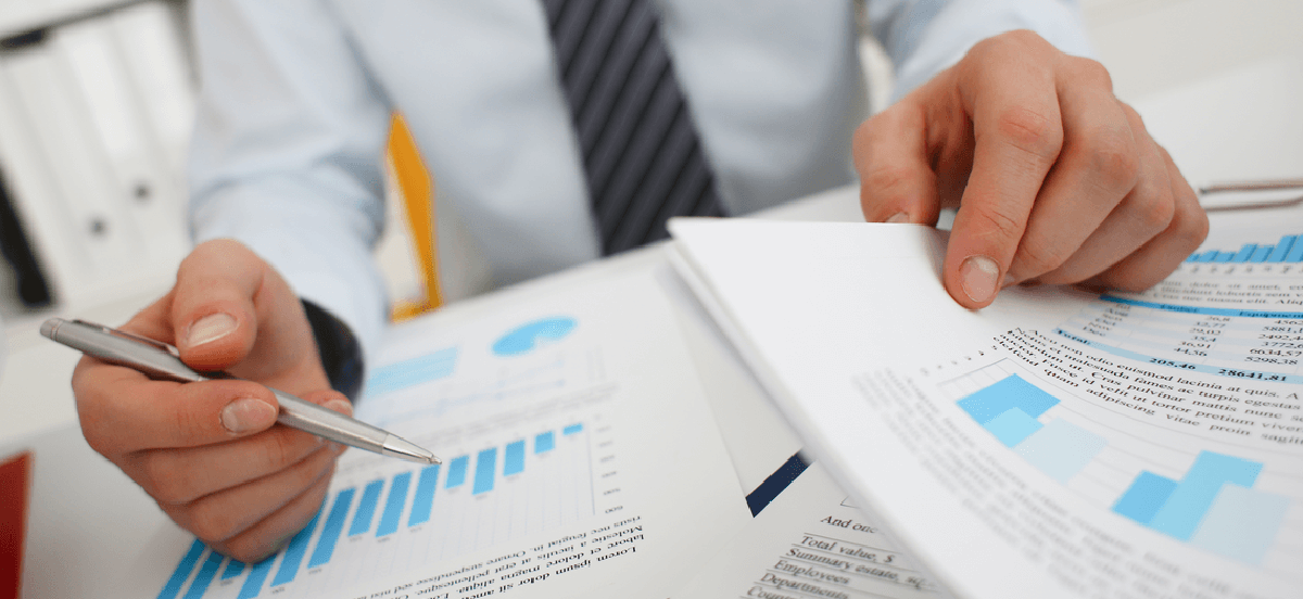 Man reviewing financial translations.