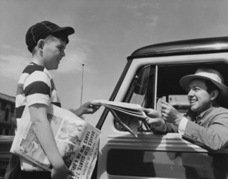 man buying newspaper